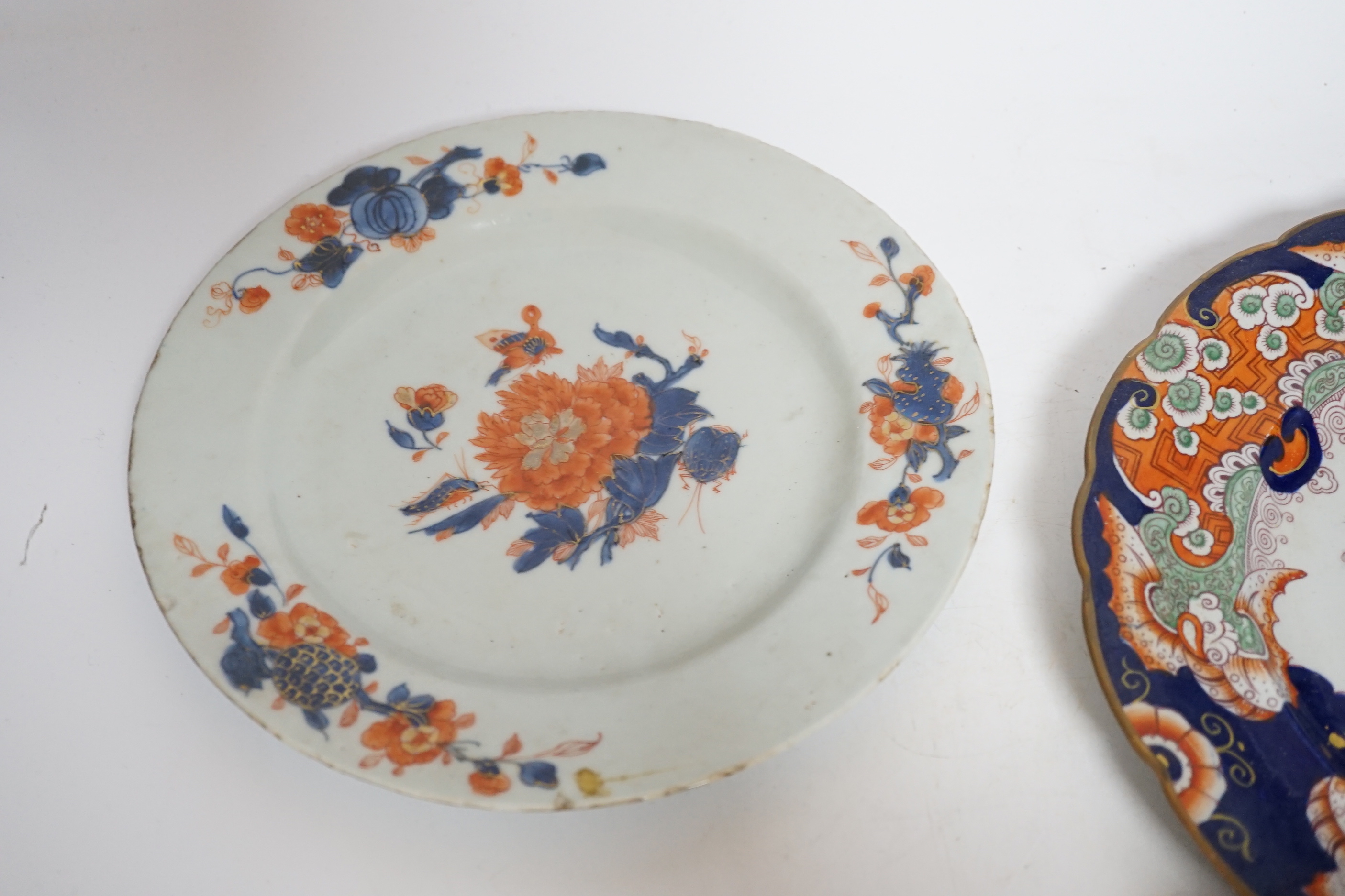 Two late 18th century pearlware Prattware plates, a Chinese export plate and an ironstone plate, largest 27cm in diameter